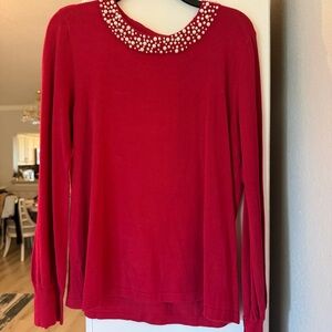 Red sweater with pearl neckline